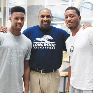 NBA point guard Norris Cole (left), who has spent two seasons with the back-to-back NBA champion Miami Heat, and development league player D’Aundray Brown (right) stopped by the Longwood campus in July to visit first-year men’s basketball head coach Jayson Gee, who coached both players at Cleveland State. ‘I think our players see it can be done,’ said Gee, in reference to the visit. ‘They don’t have to be that guy like LeBron James, who’s highly publicized.Through hard work, togetherness, submission and all those things that are our core values, you can make a successful transition to the next level.’