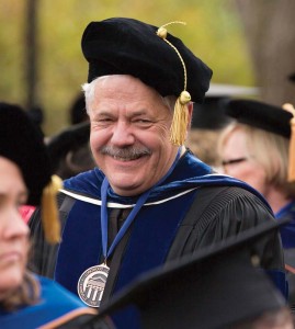 Dr. Robert Webber savors a well-deserved rest after reading 20,000 graduates’ names during his 20 years as the voice of Longwood commencement.
